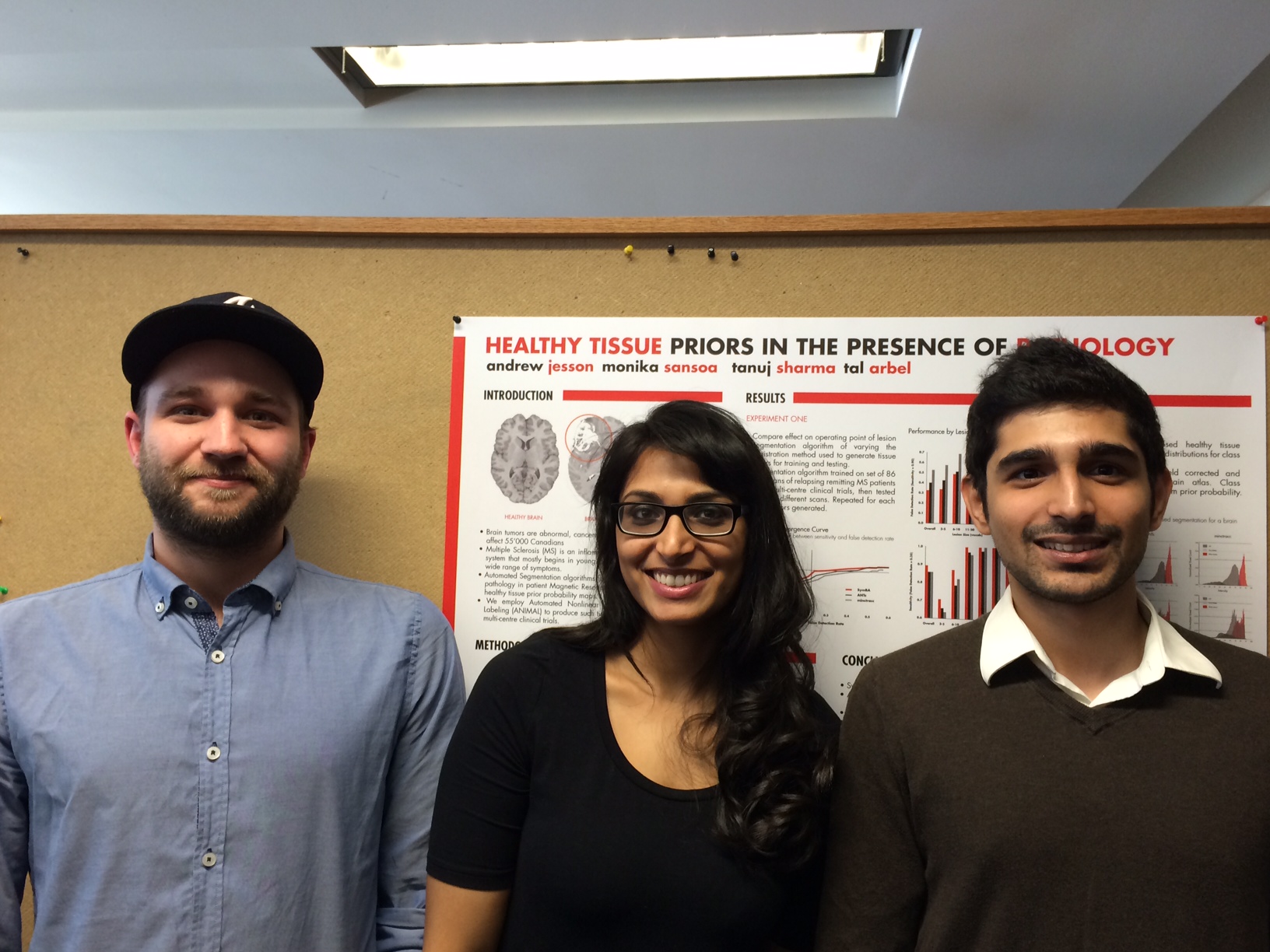 Andrew Jesson, Monika Sansoa, Tanuj Sharma present their poster for the undergraduate design project
